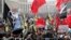 According to one NGO, about 9,000 people were in attendance at the start of the rally.