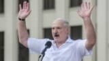 BELARUS -- Belarusian President Alyaksandr Lukashenka reacts as he addresses his supporters during a rally in Minsk, Belarus, 16 August 2020.