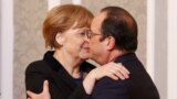 Канцлер Германии и президент Франции после переговоров. 12 февраля 2015