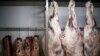 Brazil -- View of meat and cow halves at a butcher's shop, in Sao Paulo, March 20, 2017