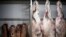 Brazil -- View of meat and cow halves at a butcher's shop, in Sao Paulo, March 20, 2017