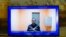 RUSSIA -- Russian opposition leader Aleksei Navalny appears on a TV screen during a live session with the court during a hearing of his appeal in a court in Moscow, January 28, 2021