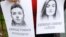LATVIA - A woman holds a portrait of opposition journalist Roman Protasevich and his girlfriend Sofia Sapega during a protest of solidarity with Roman Protasevic at the Belarusian embassy in Riga, Latvia, 25 May 2021