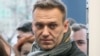 RUSSIA -- Aleksei Navalny stands outside the building of a district court before the announcement of a verdict in case of Vladimir Emelyanov, charged with public appeals for extremist activity in Moscow, December 6, 2019