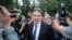 BELARUS --
Lawyer Maksim Znak, a member of the opposition's Coordination Council, is surrounded by media upon arriving at the Investigative Committee headquarters, where he was summoned for interrogation, in Minsk, August 21, 2020