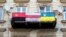 UKRAINE – Flags on the balcony of a building in Lviv. In the center is the historic white-red-white national flag of Belarus. Lviv, September 6, 2020