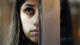 RUSSIA -- Angelina Khachaturyan, charged with murder of her father, who allegedly beat and sexually abused her and her sisters, attends a court hearing in Moscow, August 20, 2018
