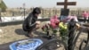 Виталина Бордова на могиле мужа Сергея Бордова, погибшего в Сирии 