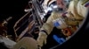 Космонавт Сергей Рязанский во время выхода в открытый космос с борта МКС