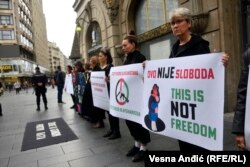Women in Belgrade, Serbia protest on September 21, 2021 against reported violations of women's rights in Afghanistan under the Taliban.