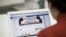 illustration a gir looking at a facebook page on a laptop september 28, 2017