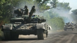 UKRAINE – Ukrainian troop move by tanks on a road of the eastern Ukrainian region of Donbas on June 21, 2022