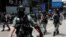 CHINA -- Riot police officers take position during a protest against the second reading of a controversial national anthem law in Hong Kong, China May 27, 2020. 