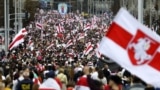 BELARUS – Protesters with old Belarusian national flags march during an opposition supporters rally in Minsk, September 6, 2020