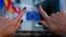 BELGIUM -- A woman shows her finger nails colored in the European colours in front of the European Parliament building in Brussels, May 24, 2019