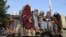 AFGHANISTAN -- Taliban fighters in a vehicle patrol the streets of Kabul, August 23, 2021