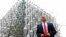 U.K. -- A Madame Tussauds wax figure of U.S. President Donald Trump stands outside the new US Embassy in Embassy Gardens in south-west London, January 12, 2018