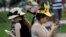 JAPAN -- Women play Pokemon Go at a Pokemon Go Park event in Yokohama, Japan August 9, 2017. 