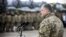 UKRAINE – Ukraine's President Petro Poroshenko delivers a speech during a ceremony to hand over weapons and military vehicles to servicemen of the Ukrainian armed forces at an airforce base near Zhytomyr, December 21, 2018