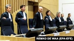  The judges take their seats in the courtroom of the heavily secured Schiphol Judicial Complex at the start of the international MH17 trial in Badhoevedorp, The Netherlands on March 9, 2020.