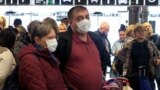 Russian tourists wait for the check in to board the last plane from the closed airport due to coronavirus disease (COVID-19) fears, in Brnik, Slovenia, March 17, 2020. REUTERS/Borut Zivulovic - RC2LLF9S4CR3