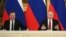 RUSSIA – MOSCOW, DECEMBER 27, 2018: Russian Prime Minister Dmitry Medvedev (Left) and Russian President Vladimir Putin at a State Council meeting on the development of volunteering and socially oriented NGOs, at the Moscow Kremlin.