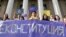 KAZAKHSTAN -- Participants hold a banner, which reads "Reconstitution", during a rally demanding a constitutional reform in Almaty, Kazakhstan August 30, 2019
