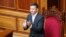 Ukrainian President Volodymyr Zelenskiy applauds during the first session of Ukraine's newly-elected parliament in Kyiv on August 29.