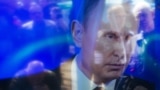 Изображение Владимира Путина по ТВ, Луганск, 2014 год