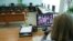 Russia -- A teacher gives an online lesson in an empty classroom