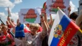 BELARUS -- Supporters of Belarusian President Alyaksandr Lukashenka take part in a rally in Minsk, Belarus, 16 August 2020.