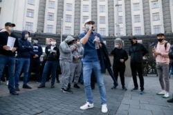 In late April 2020, small-business employees in Kyiv demand that the Ukrainian government lift anti-coronavirus restrictions that have brought their work to a standstill.