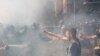 Столкновения между участниками "Нацкорпуса" и полицией возле офиса президента Украины в Киеве, 14 августа 2021 года. Фото: украинская служба Радио Свобода