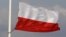 Poland - A Polish national flag is at half mast in front of the stage for a commemoration ceremony for the plane crash victims at the Pilsudski square in Warsaw, 16Apr2010