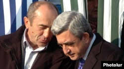 Former President Serzh Sarkisian (right) and his predecessor, Robert Kocharian, at an official ceremony outside Yerevan in December 2008.