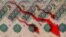 GENERIC – Red arrows pointing down on the background of russian money