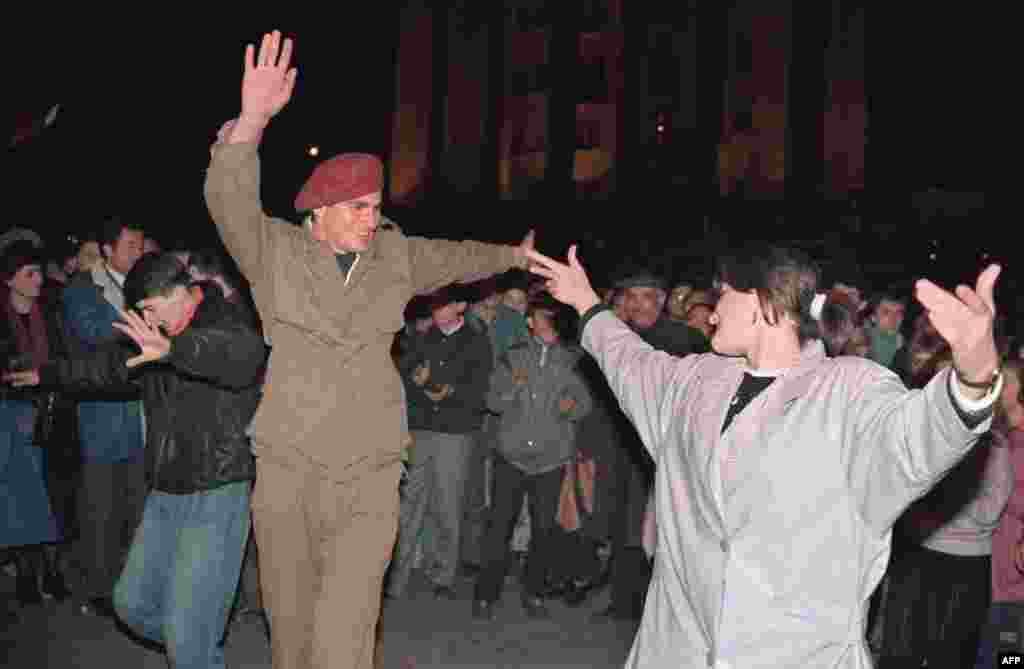 A Georgian Army soldier dances on a square in Tbilisi on April 10, 1991, after the republic declared independence from the Soviet Union.&nbsp;
