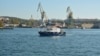 UKRAINE - Port cranes and a boat in the Sevastopol port, 15Oct2019