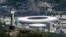 Brazil -- An aerial view of the Christ the Redeemer statue atop Corcovado Hill and the Mario Filho (Maracana) stadium in Rio de Janeiro, December 3, 2013