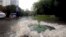 Russia -- A picture shows a sewer overflowing during floods in Moscow, August 15, 2016