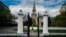 A man jogs in front of the building of the Moscow State University in Moscow on May 7, 2020
