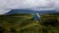 Russia -- A country house stands on a highpoint overlooking the coast of the Okhotsk Sea on the Kuril Islands. September 16, 2015