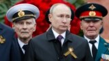 RUSSIA - Tajikistan's President Emomali Rahmon and Russia's President Vladimir Putin (L-R front) attend a flower laying ceremony at the Tomb of the Unknown Soldier by the Kremlin Wall to mark the 76th anniversary of the victory over Nazi Germany in World,