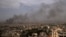 Smoke rises from Beirut's southern suburbs following an Israeli strike