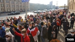 Supporters of a nationwide strike in Belarus march in Minsk on October 26, 2020.