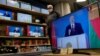 Belarus - Belarusian President Alexander Lukashenko is seen on TV screens at an electronics store during his annual address to the Belarusian people and the National Assembly, Minsk, 4aug2020