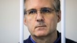 RUSSIA -- Former U.S. Marine Paul Whelan, who was detained and accused of espionage, stands inside a defendants' cage during a court hearing on extending his pre-trial detention, in Moscow, Russia October 24, 2019.