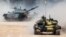 Экипажи танков Т-72 на соревнованиях "Танковый биатлон" в рамках Армейских международных игр-2016 на полигоне Алабино, 2 августа 2016 