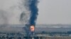 SYRIA - Smoke and fire rising from the Syrian town of Ras al-Ain during the Turkish offensive against Kurdish groups in northeastern Syria, Octobrer 17,201