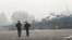 UKRAINE -- Ukrainian servicemen walk past fighter jets ahead of the opening ceremony of the Clear Sky 2018 multinational military drills at Starokostiantyniv Air Base in Khmelnytskiy Region, October 12, 2018
